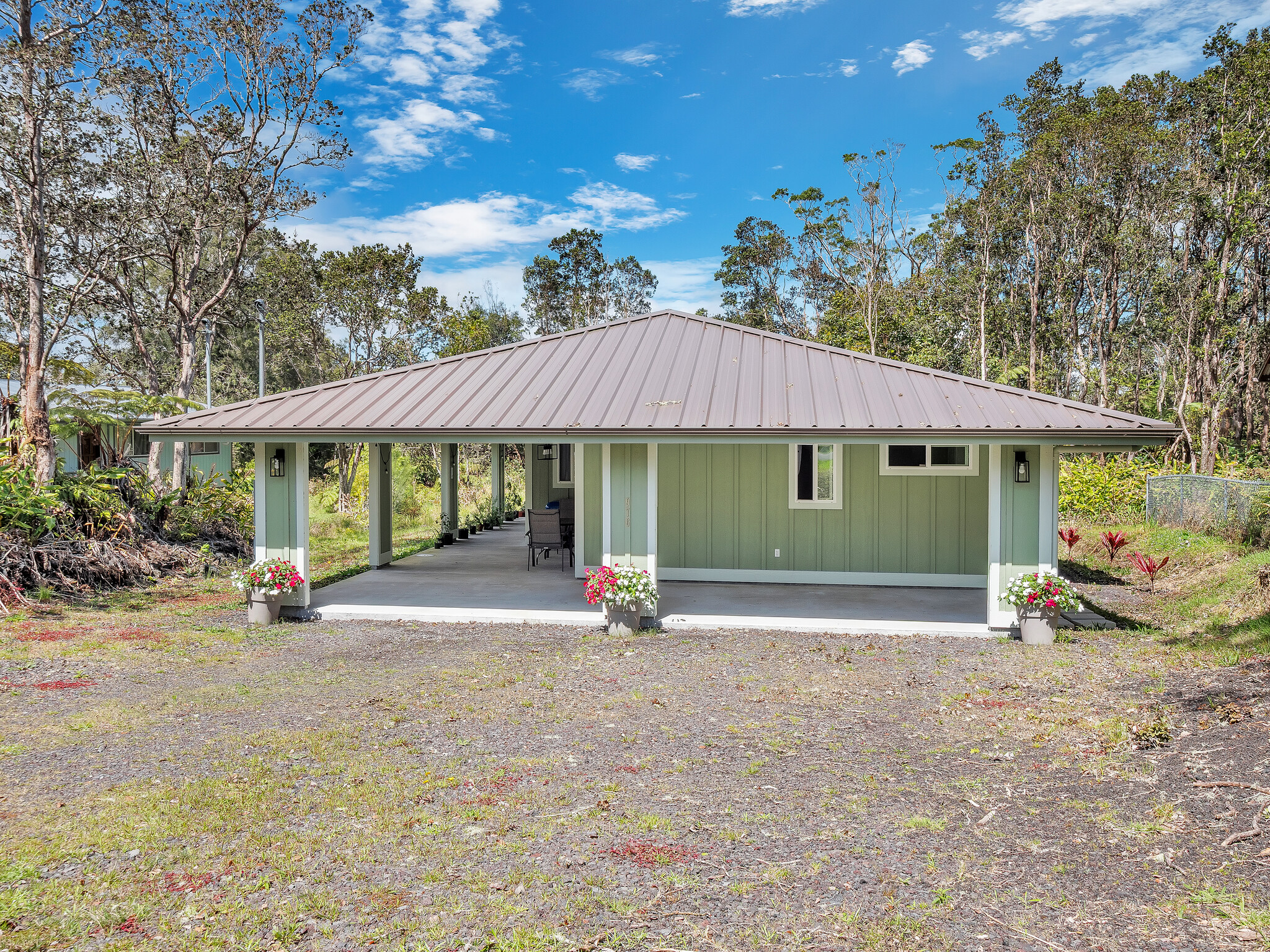 11-3976 Liona Street Volcano, HI 96785 - Photo 1 of 27 a view of a house with backyard and garden