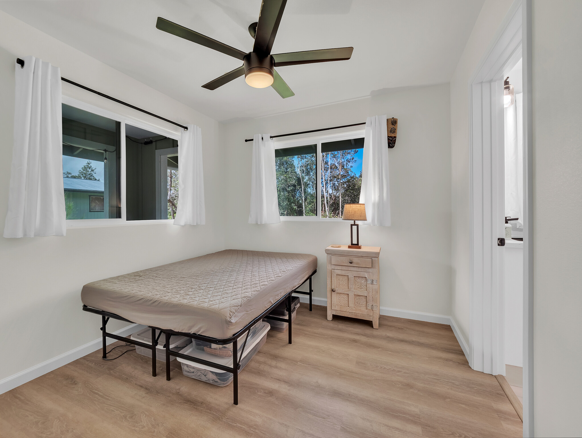 11-3976 Liona Street Volcano, HI 96785 - Photo 18 of 27 a room with furniture and a window
