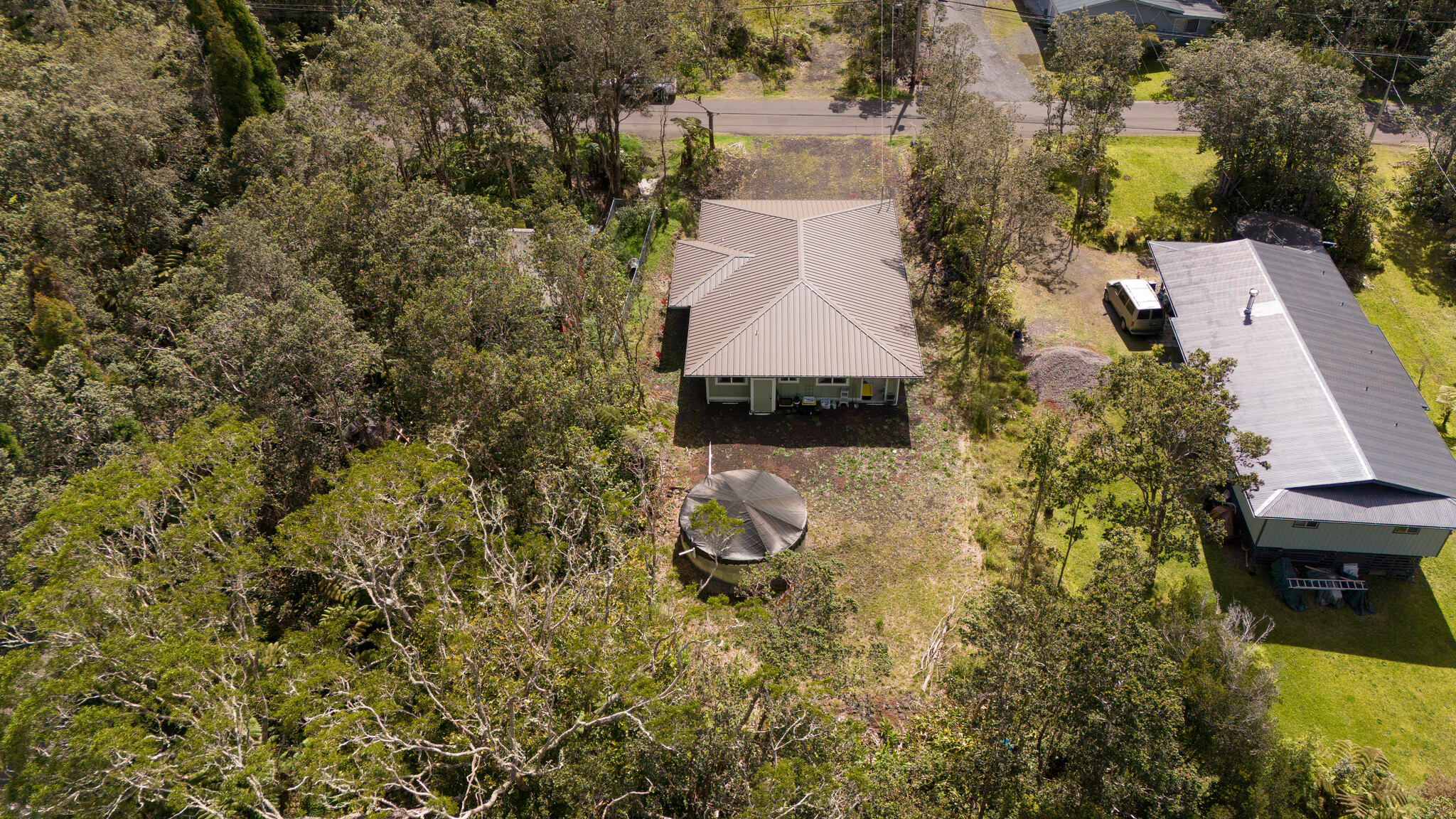 11-3976 Liona Street Volcano, HI 96785 - Photo 26 of 27 an aerial view of a house with a yard basket ball court and outdoor seating