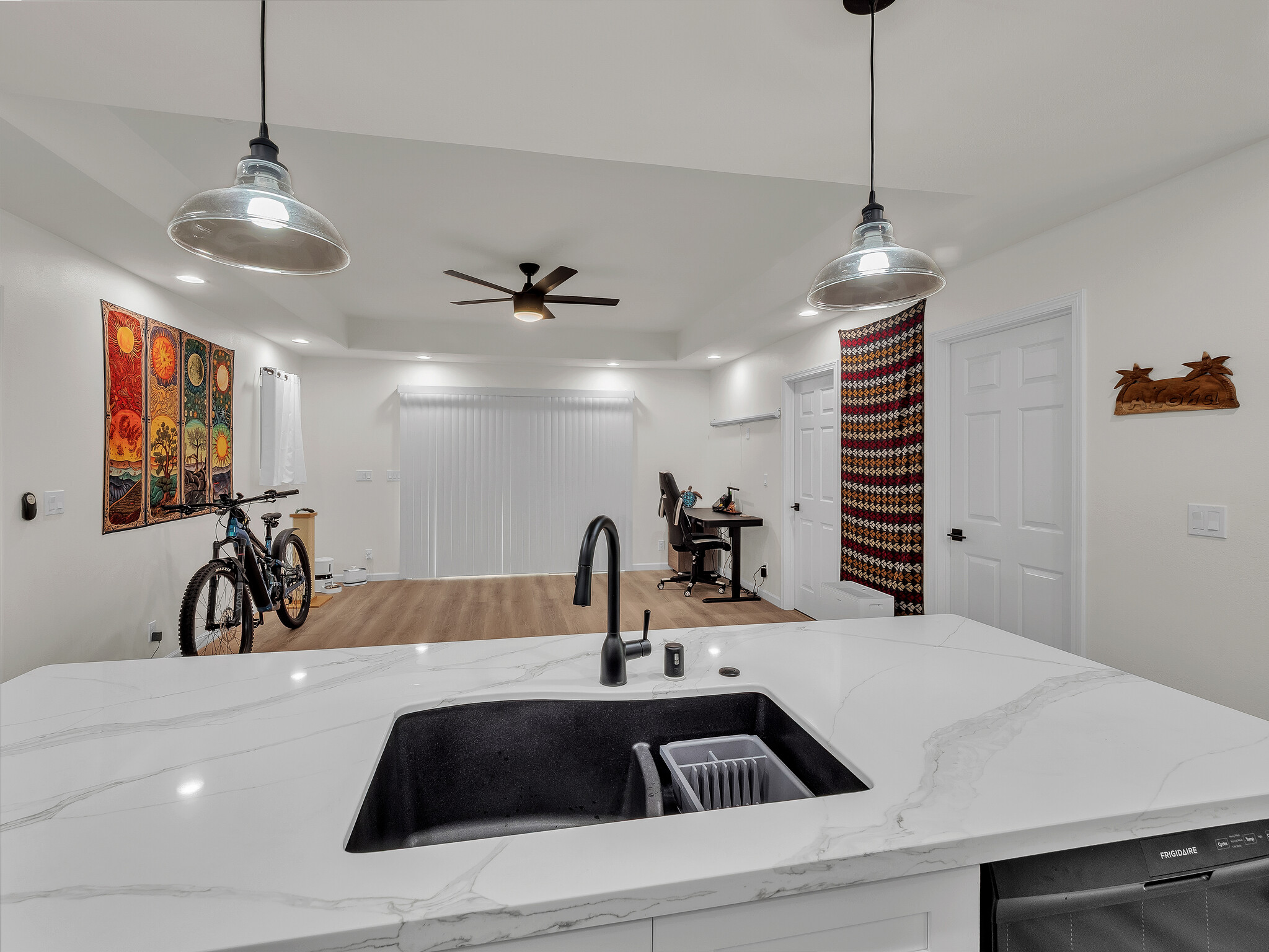 11-3976 Liona Street Volcano, HI 96785 - Photo 4 of 27 a kitchen with a sink a counter and appliances
