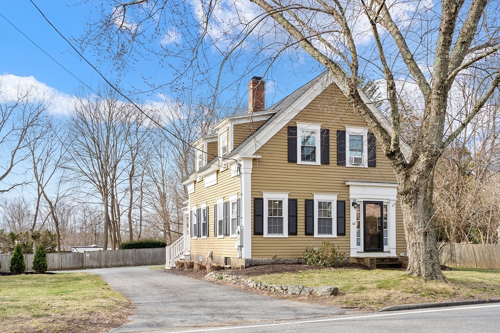a front view of house with yard