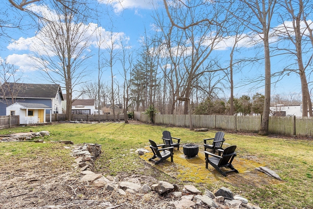 102 Centre Street Danvers, MA 01923 - Photo 28 of 36 a view of a house with backyard and sitting area