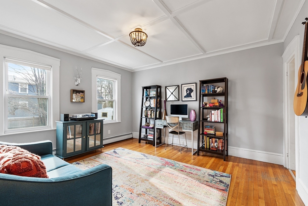 102 Centre Street Danvers, MA 01923 - Photo 7 of 36 a living room with furniture and a wooden floor
