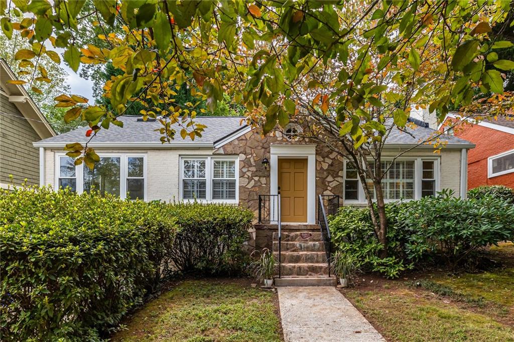 1733 Coventry Road Decatur, GA 30030 - Photo 1 of 1 front view of a house with a tree
