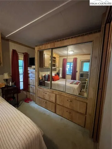 a en suite bathroom with sink and mirror