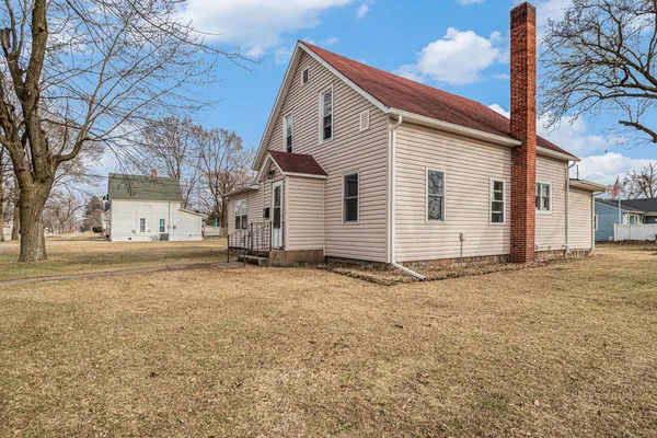 a house with yard covered in it