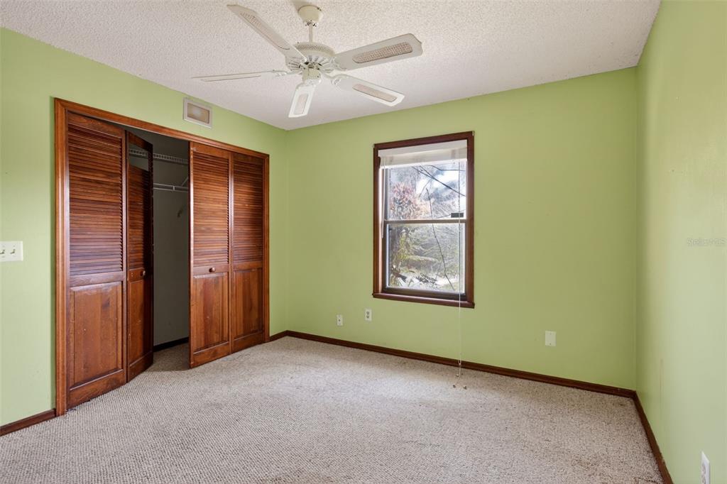 1620 Timbercrest Drive Deltona, FL 32738 - Photo 18 of 28 a view of an empty room with a window