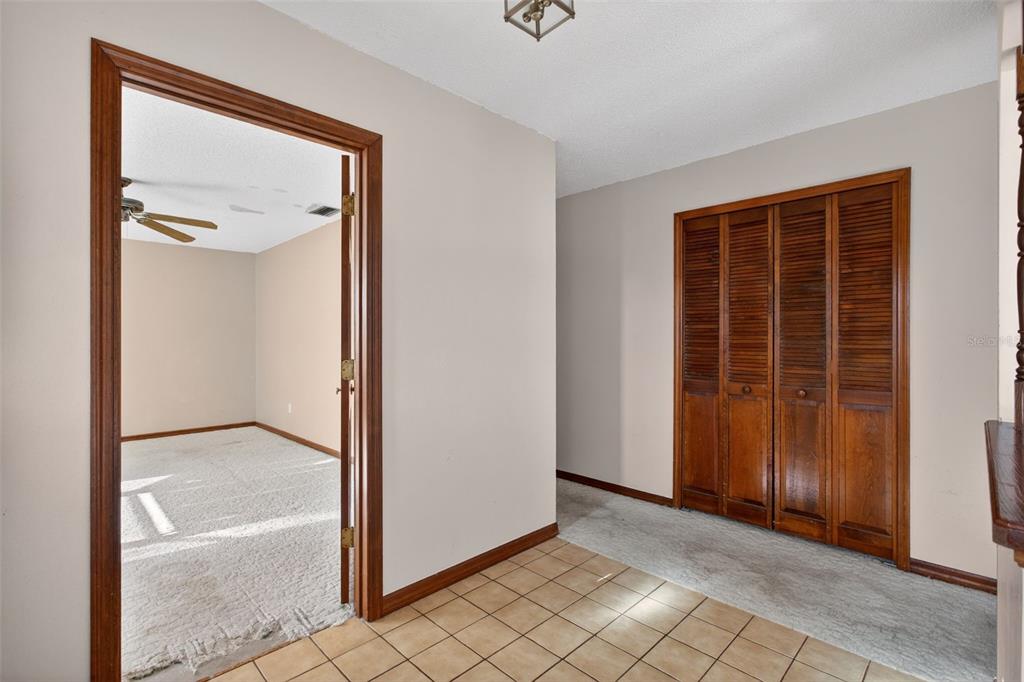 1620 Timbercrest Drive Deltona, FL 32738 - Photo 23 of 28 a view of an empty room with windows