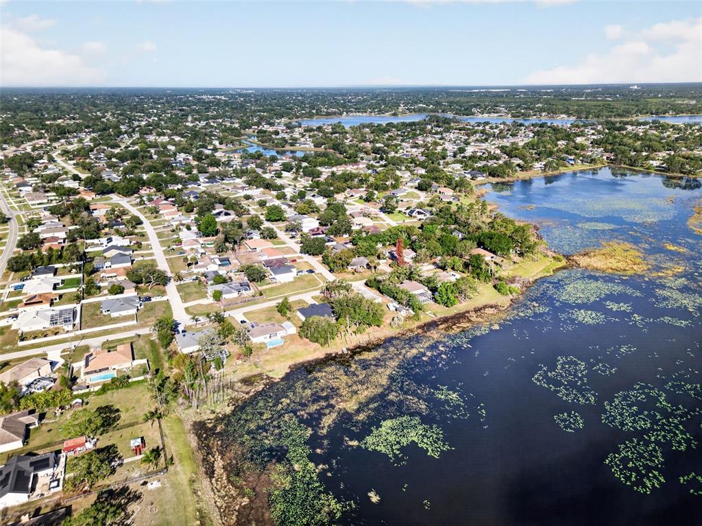 1620 Timbercrest Drive Deltona, FL 32738 - Photo 27 of 28 an aerial view of residential building with ocean view