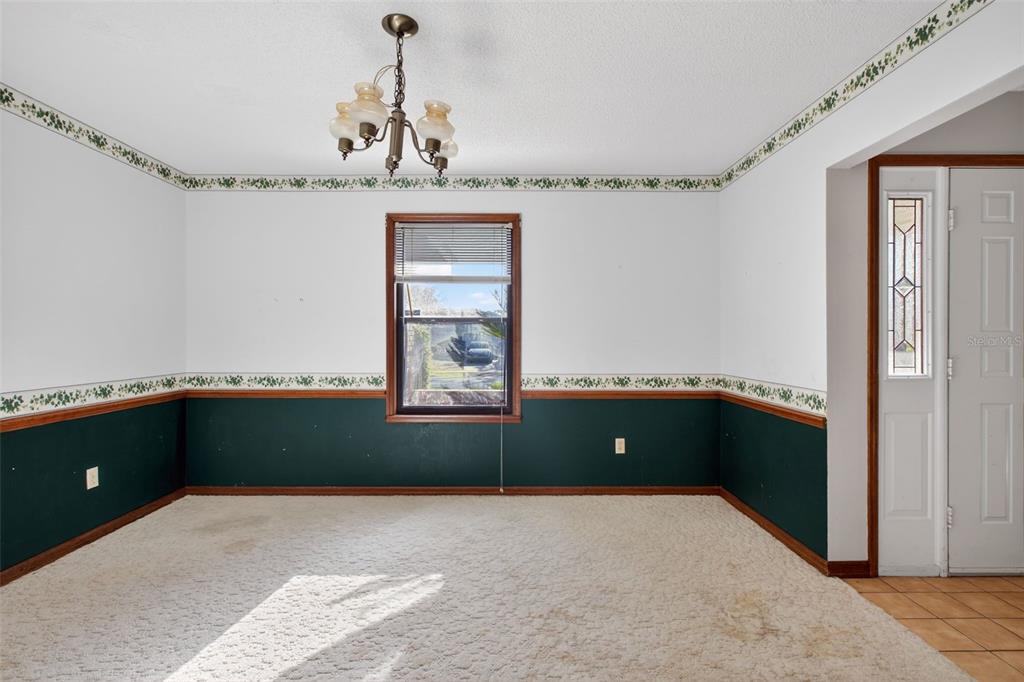 1620 Timbercrest Drive Deltona, FL 32738 - Photo 5 of 28 a kitchen that has a cabinets and a window