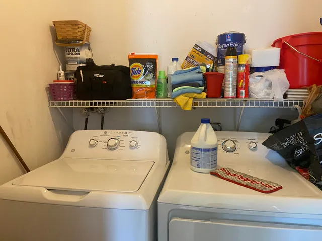 a utility room with dryer and washer