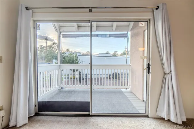 a view of a porch with a door