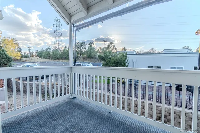 a view of a balcony with city view