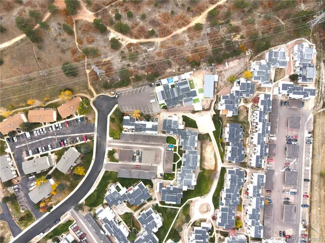 an aerial view of a house with a mountain view