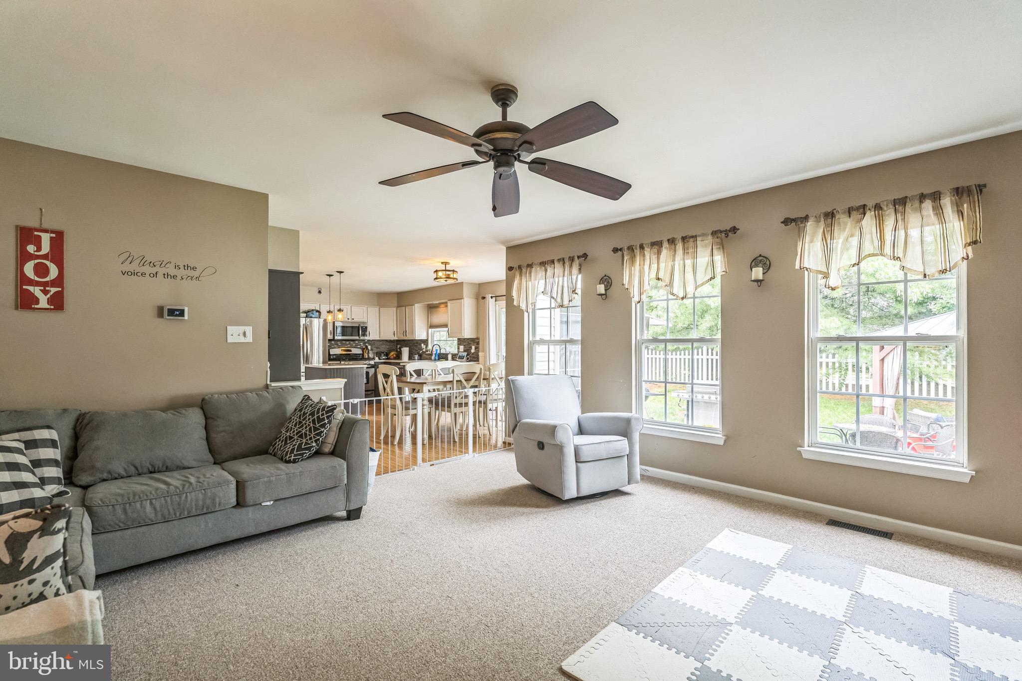 112 Lantern Way Deptford, NJ 08096 - Photo 11 of 30 a living room with furniture and a large window