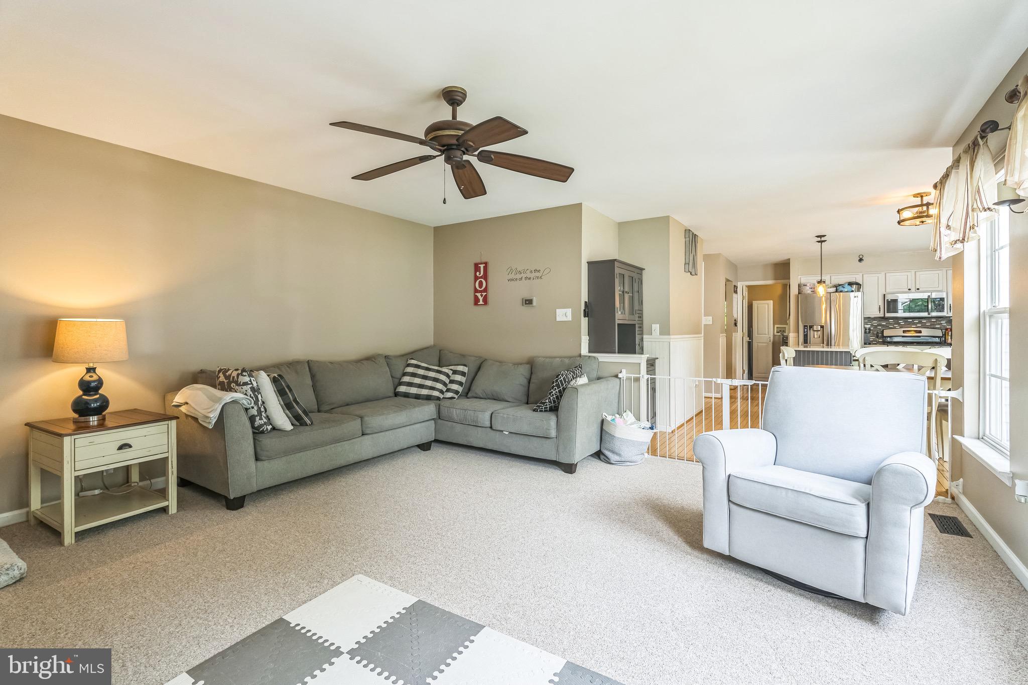 112 Lantern Way Deptford, NJ 08096 - Photo 12 of 30 a living room with furniture and a large window