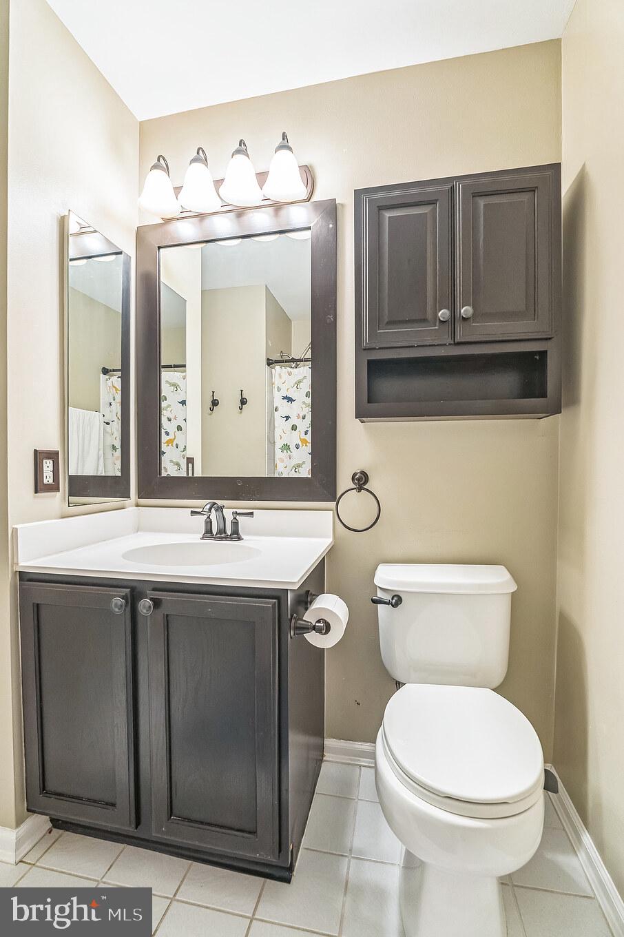 112 Lantern Way Deptford, NJ 08096 - Photo 21 of 30 a bathroom with a granite countertop toilet sink and mirror