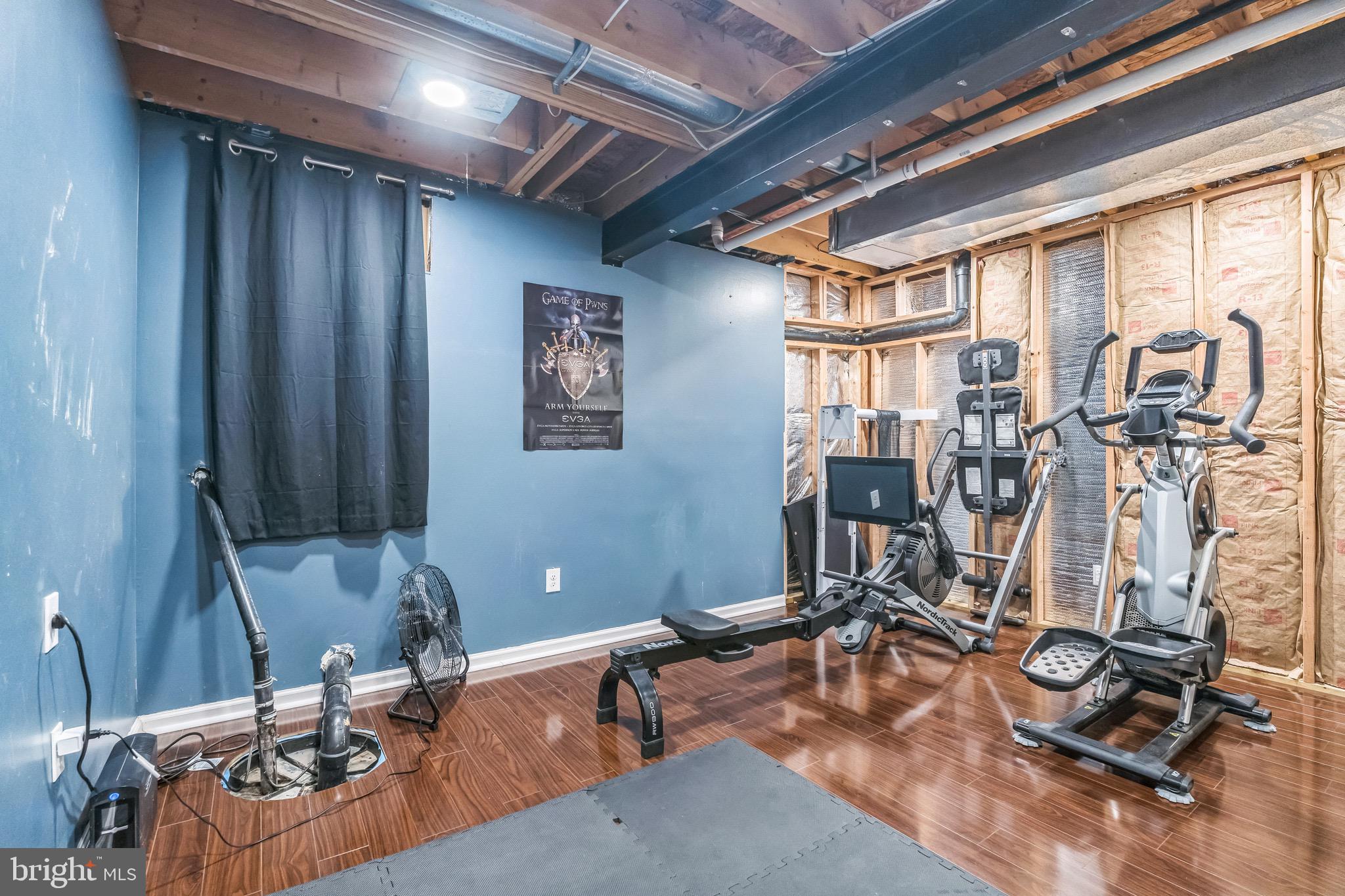 112 Lantern Way Deptford, NJ 08096 - Photo 27 of 30 a room with gym equipment and windows