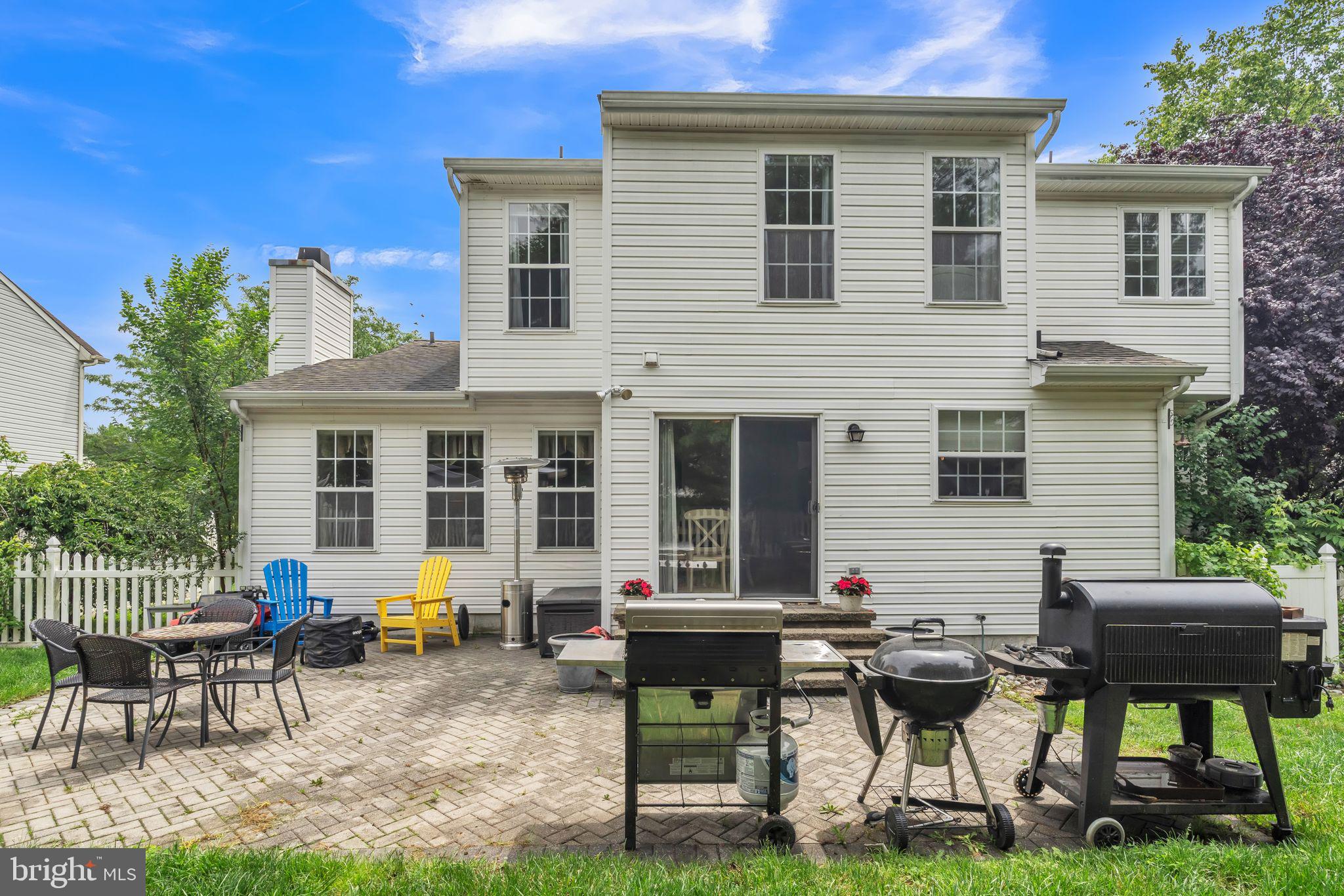 112 Lantern Way Deptford, NJ 08096 - Photo 28 of 30 a backyard of a house with barbeque oven table and chairs