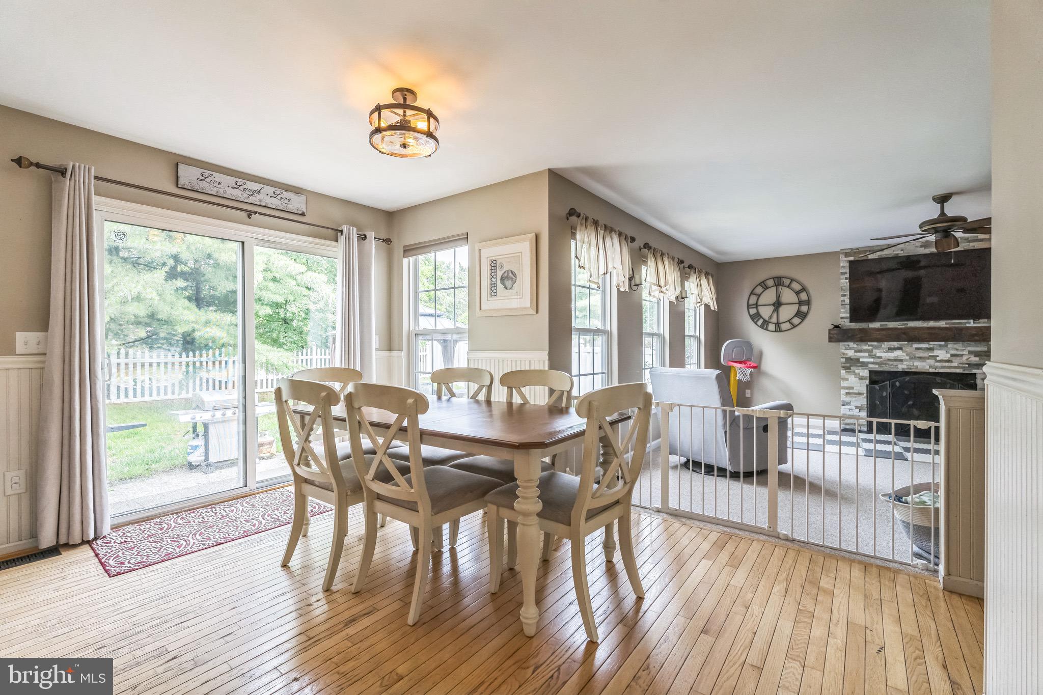 112 Lantern Way Deptford, NJ 08096 - Photo 9 of 30 a view of a dining room with furniture window and wooden floor