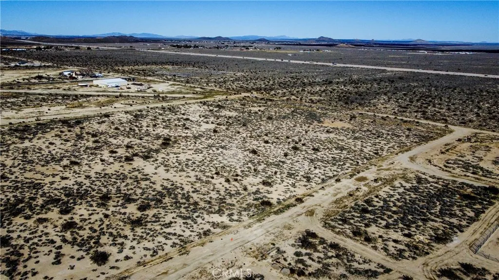 0 Fickett Mojave, CA 93501 - Photo 16 of 18 a view of a pathway next to a yard