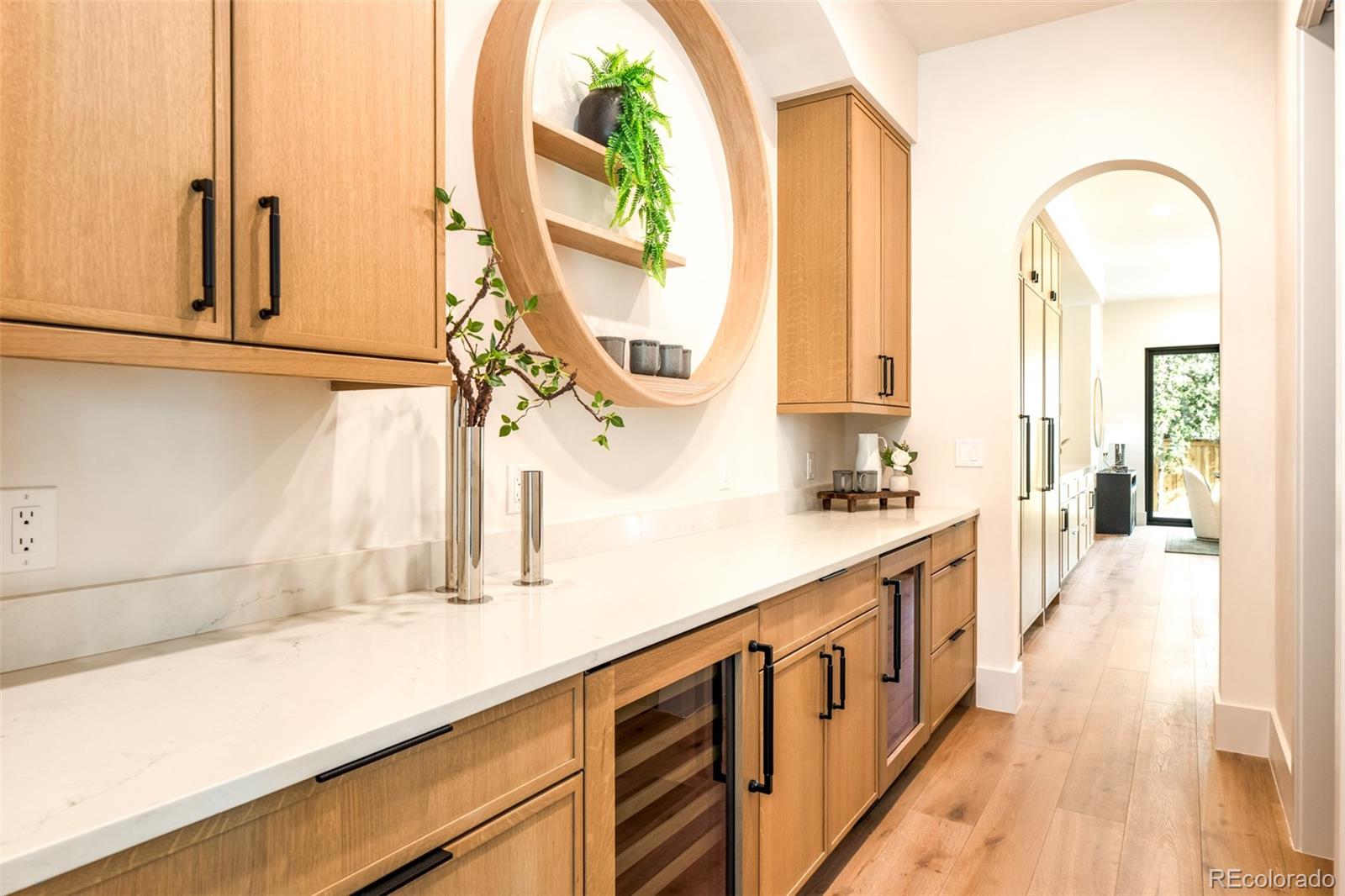 404 Kearney Street Denver, CO 80220 - Photo 15 of 44 a view of a bathroom with a sink and a window