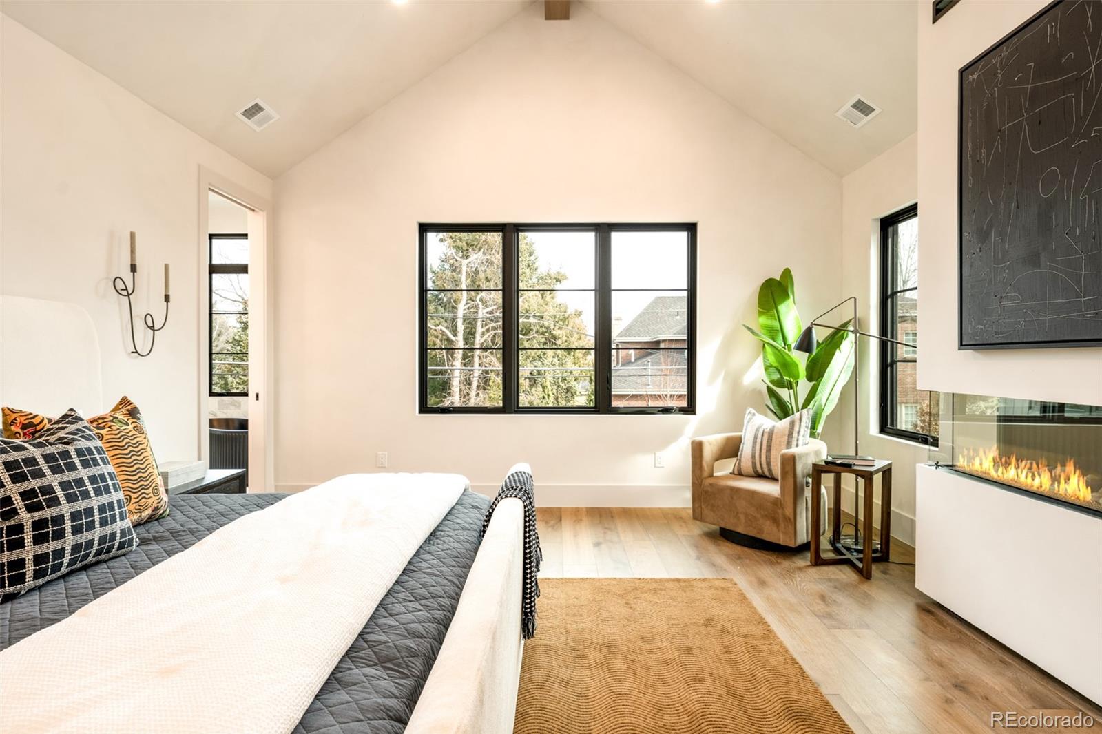 404 Kearney Street Denver, CO 80220 - Photo 20 of 44 a living room with furniture and a large window