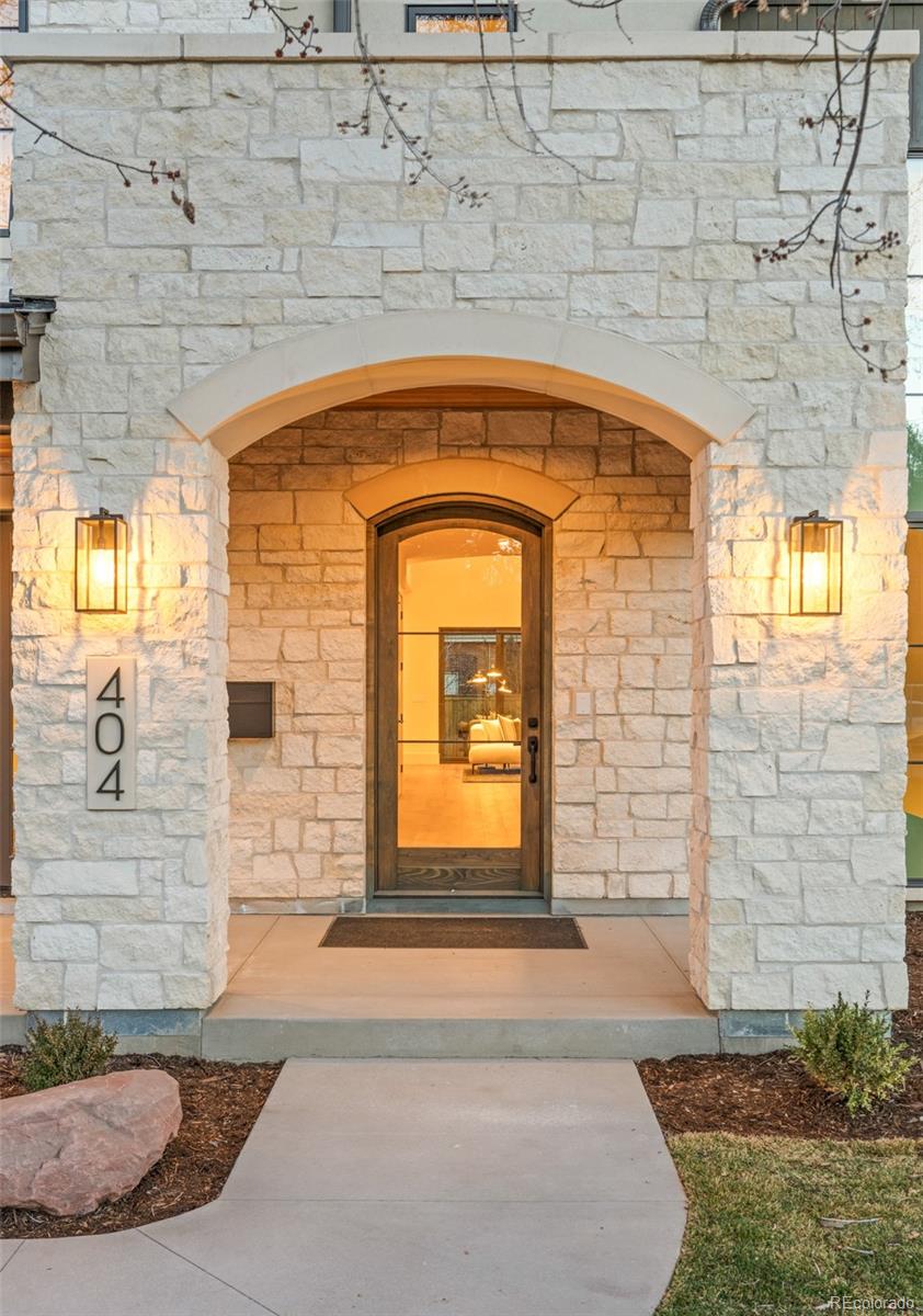404 Kearney Street Denver, CO 80220 - Photo 2 of 44 a front view of a house with a yard