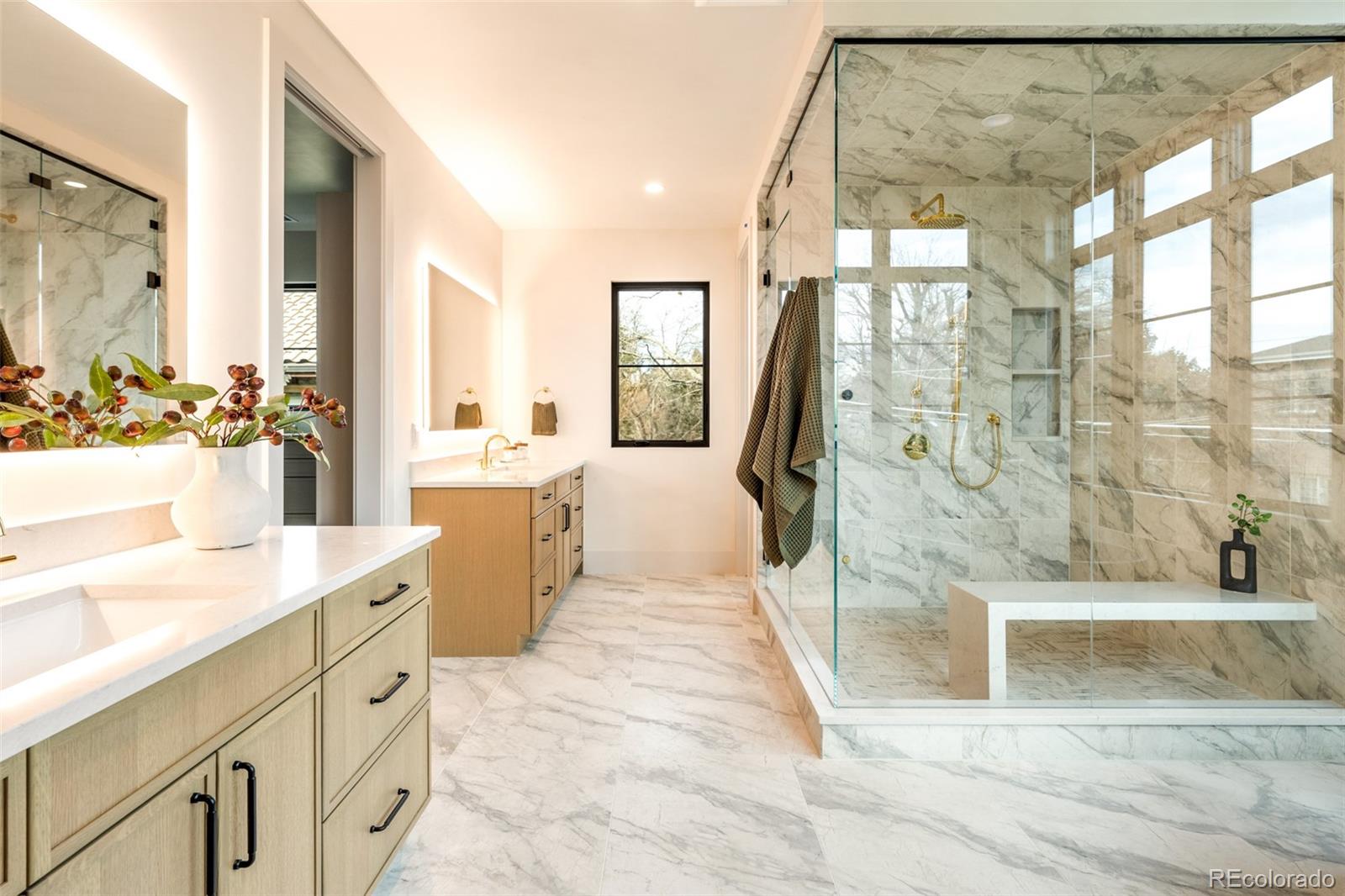 404 Kearney Street Denver, CO 80220 - Photo 23 of 44 a bathroom with a granite countertop sink mirror and shower