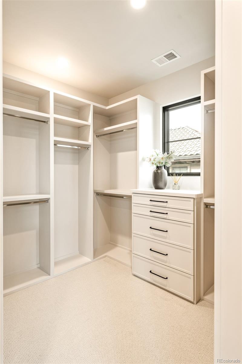 404 Kearney Street Denver, CO 80220 - Photo 26 of 44 a room with a furniture and a window