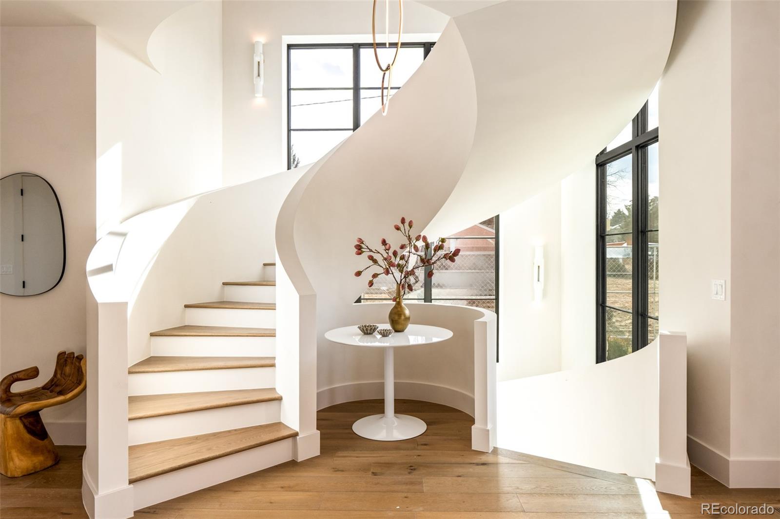 404 Kearney Street Denver, CO 80220 - Photo 3 of 44 a view of entryway and hall with wooden floor