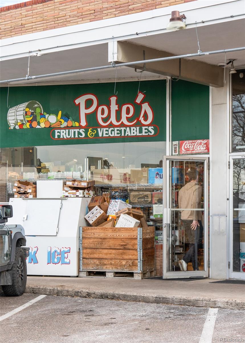 404 Kearney Street Denver, CO 80220 - Photo 42 of 44 a store with a outdoor seating area and a stove