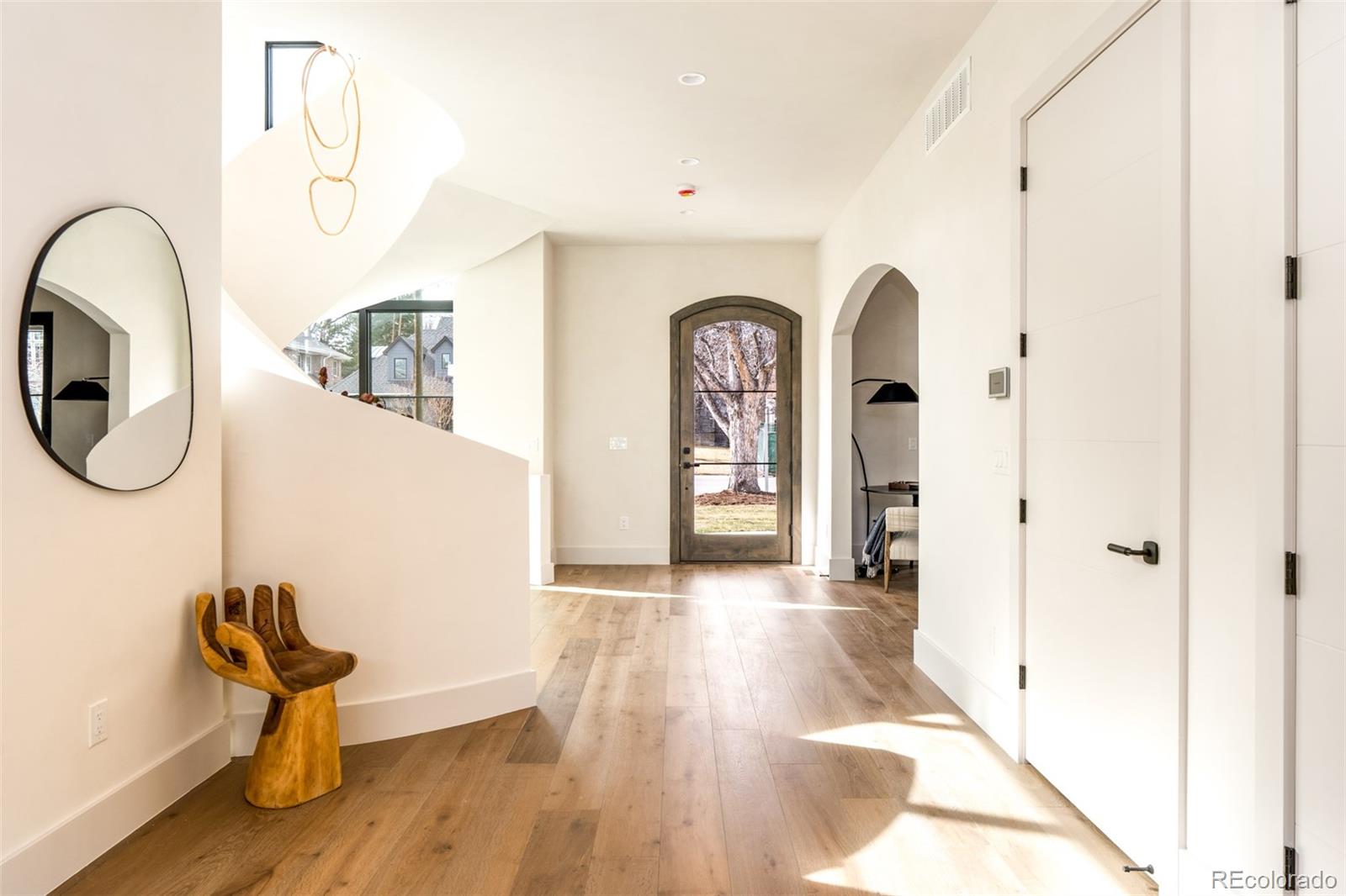 404 Kearney Street Denver, CO 80220 - Photo 5 of 44 a view of entryway with wooden floor