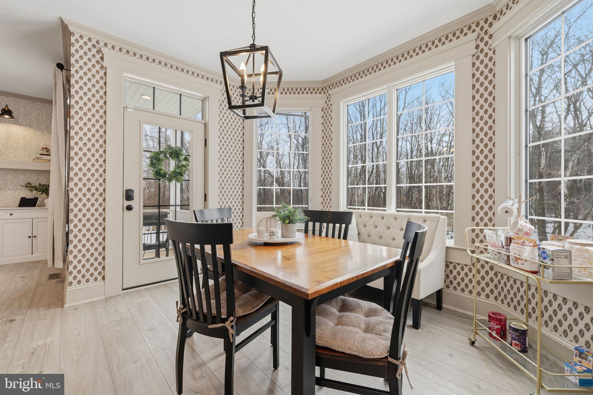 86 Hinsons Ford Road Amissville, VA 20106 - Photo 15 of 64 a view of a dining room with furniture window and wooden floor