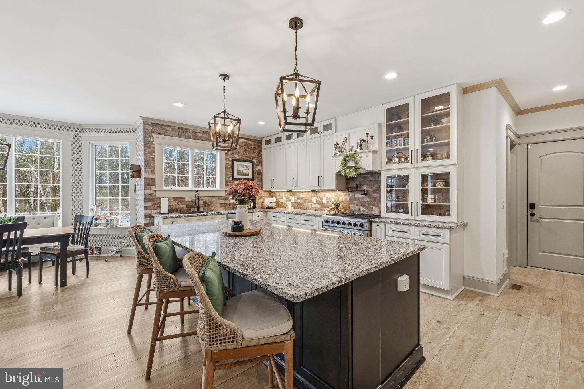 86 Hinsons Ford Road Amissville, VA 20106 - Photo 19 of 64 a dining table with chairs and chandelier