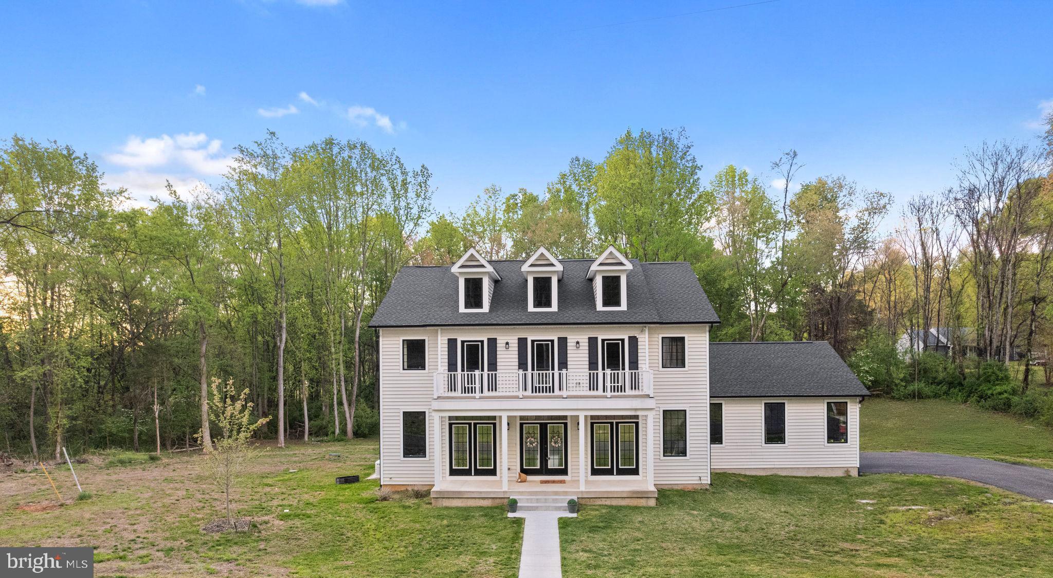 86 Hinsons Ford Road Amissville, VA 20106 - Photo 3 of 64 a front view of a house with a yard