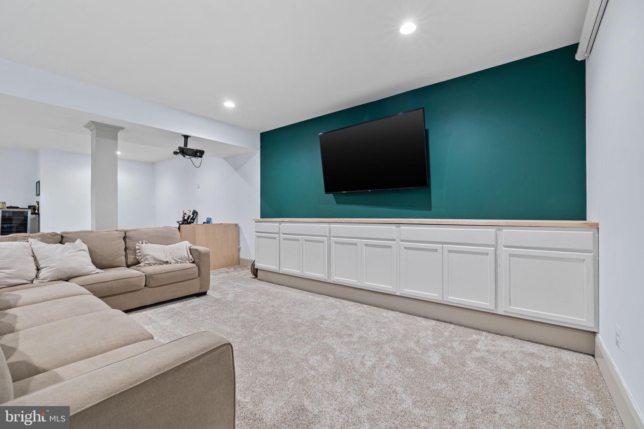 86 Hinsons Ford Road Amissville, VA 20106 - Photo 49 of 64 a living room with furniture and a flat screen tv