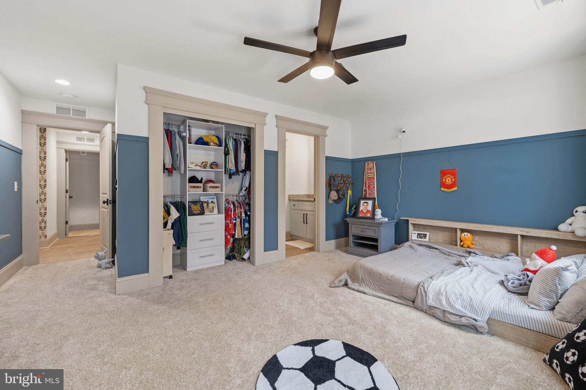 86 Hinsons Ford Road Amissville, VA 20106 - Photo 56 of 88 a bedroom with furniture and a chandelier