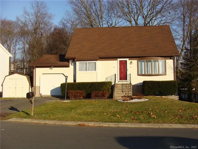 a view of swimming pool with a yard