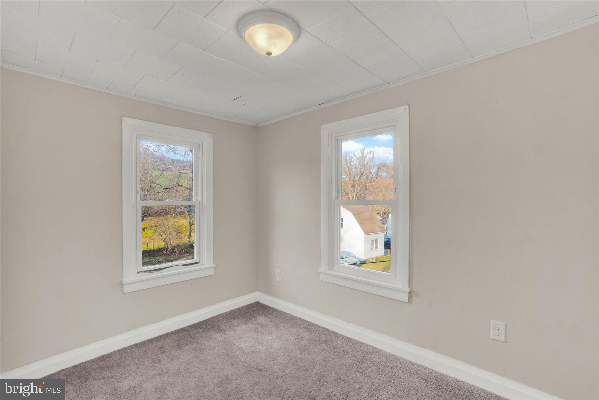 1953 Craley Road Windsor, PA 17366 - Photo 17 of 28 an empty room with windows