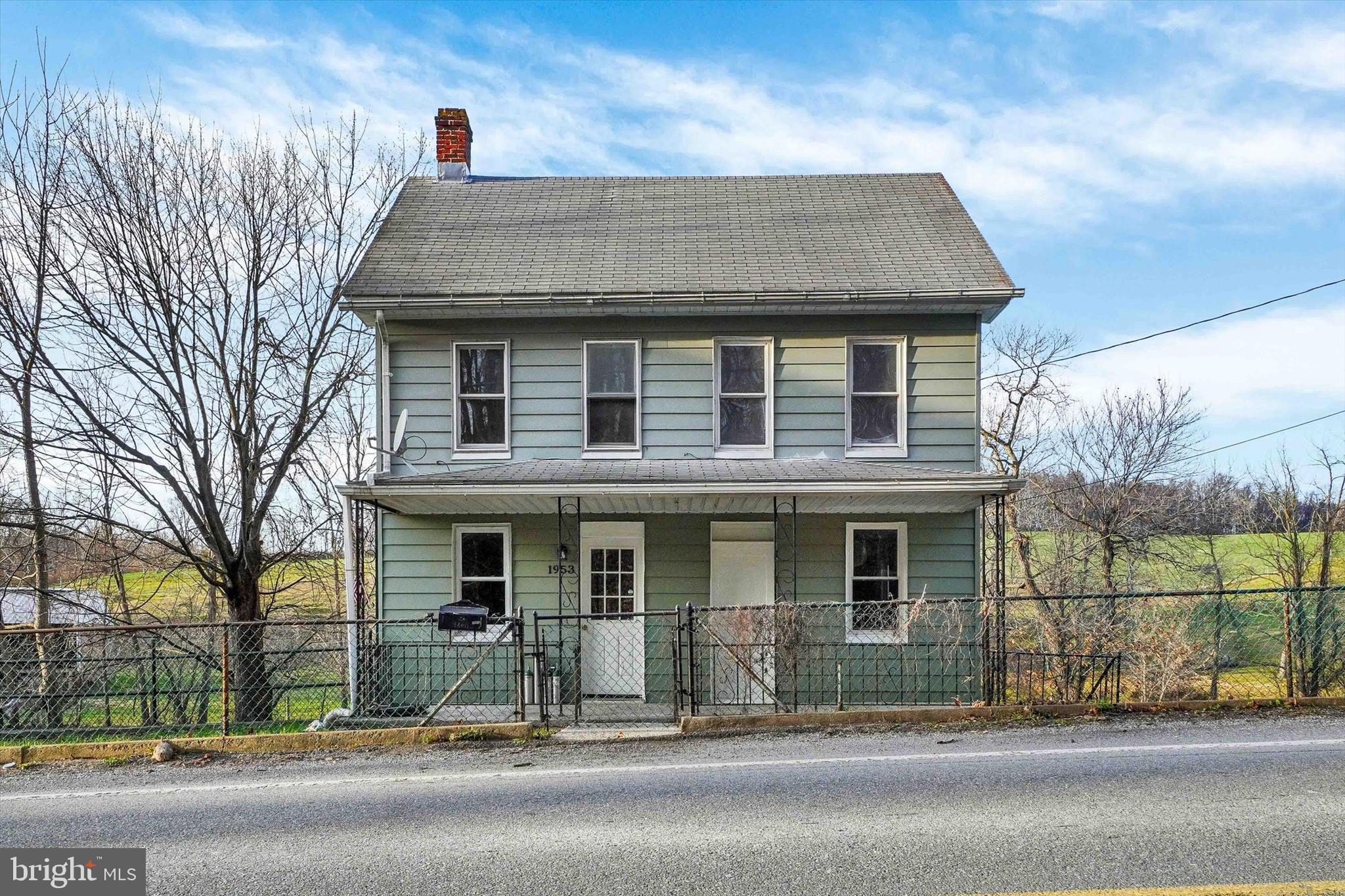 1953 Craley Road Windsor, PA 17366 - Photo 2 of 28 a front view of a house with a garden