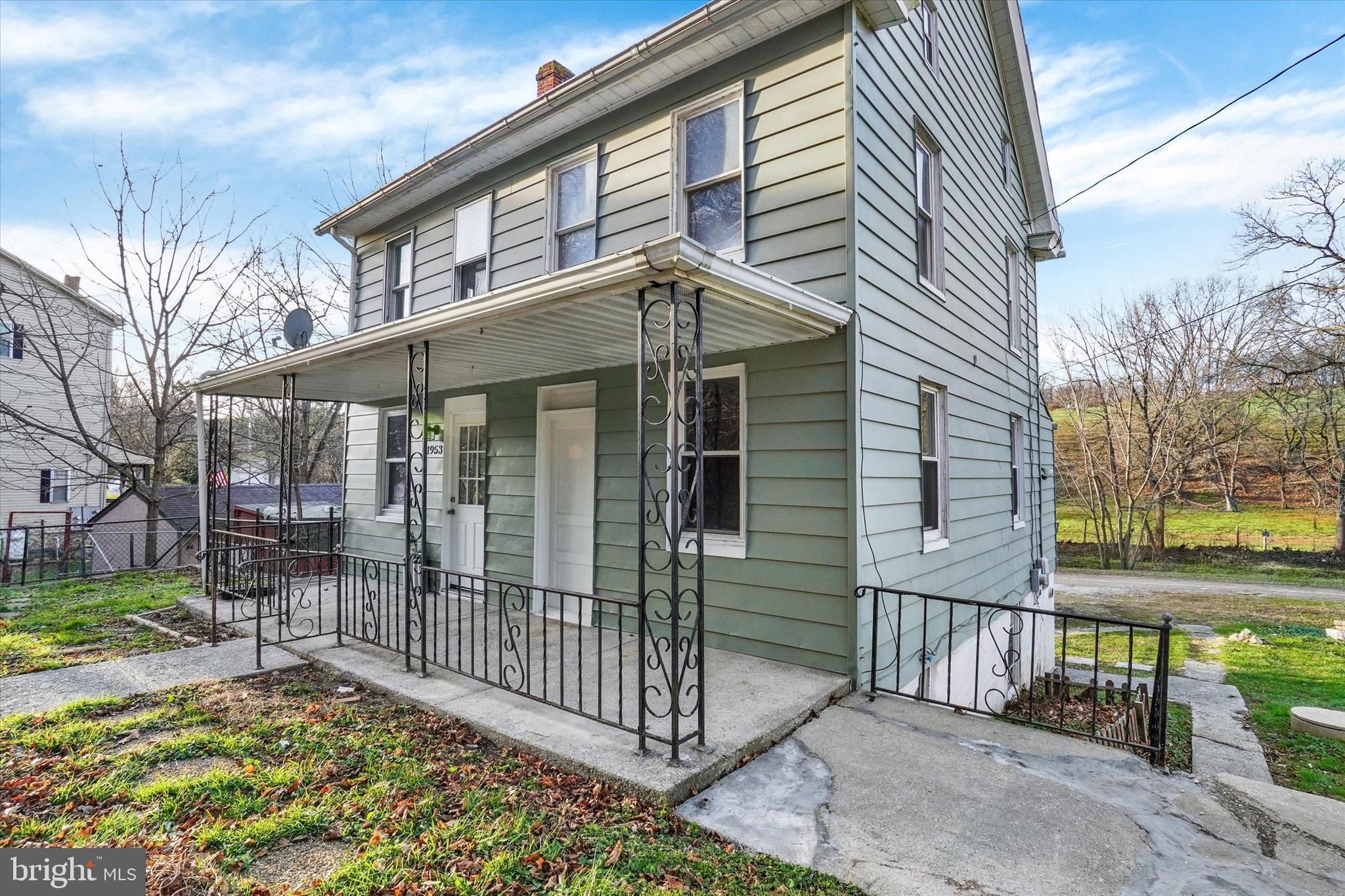 1953 Craley Road Windsor, PA 17366 - Photo 3 of 28 a view of a house with a small yard and a large tree front of house
