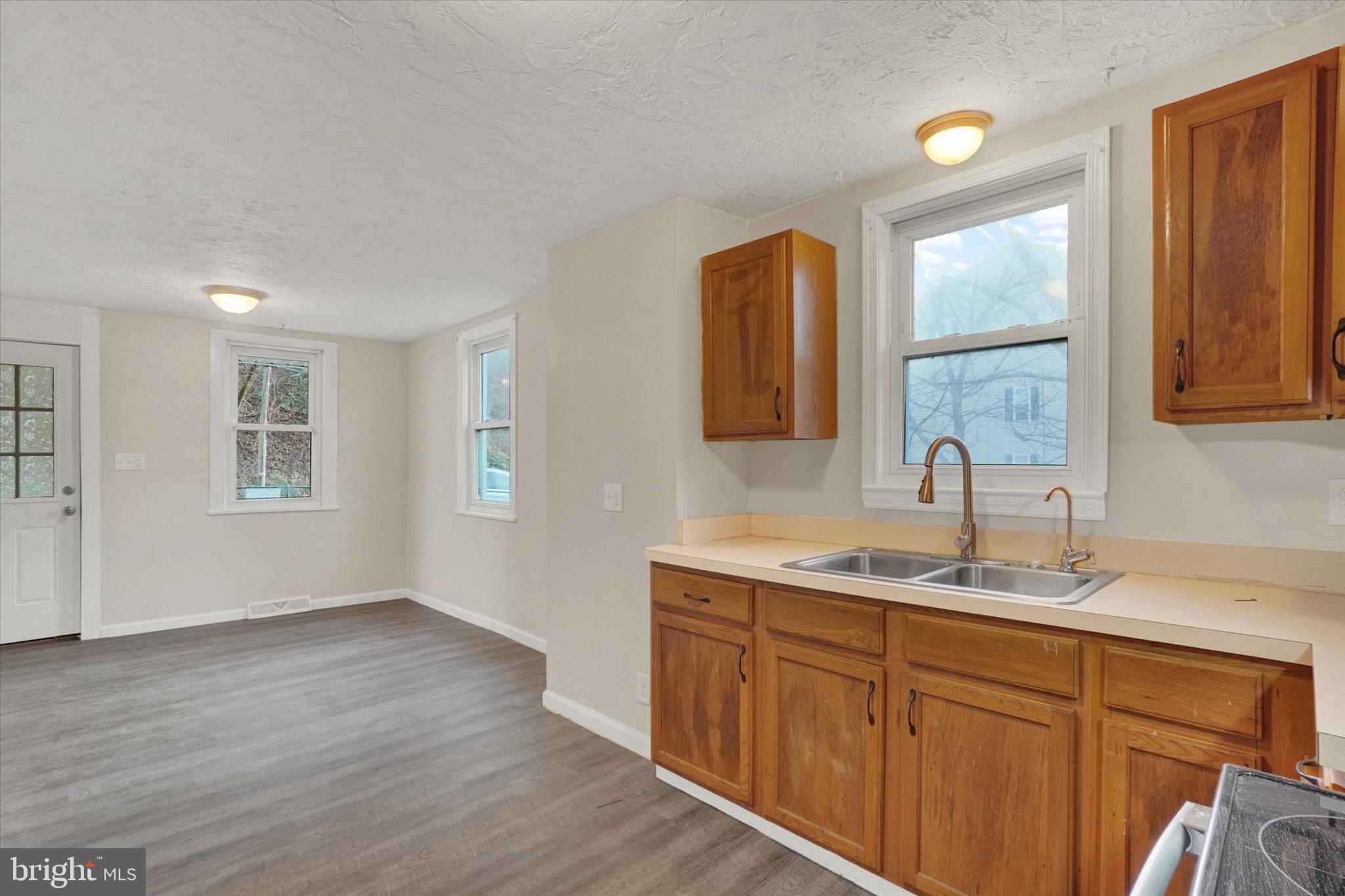 1953 Craley Road Windsor, PA 17366 - Photo 8 of 28 a bathroom with a double vanity sink a mirror and a window
