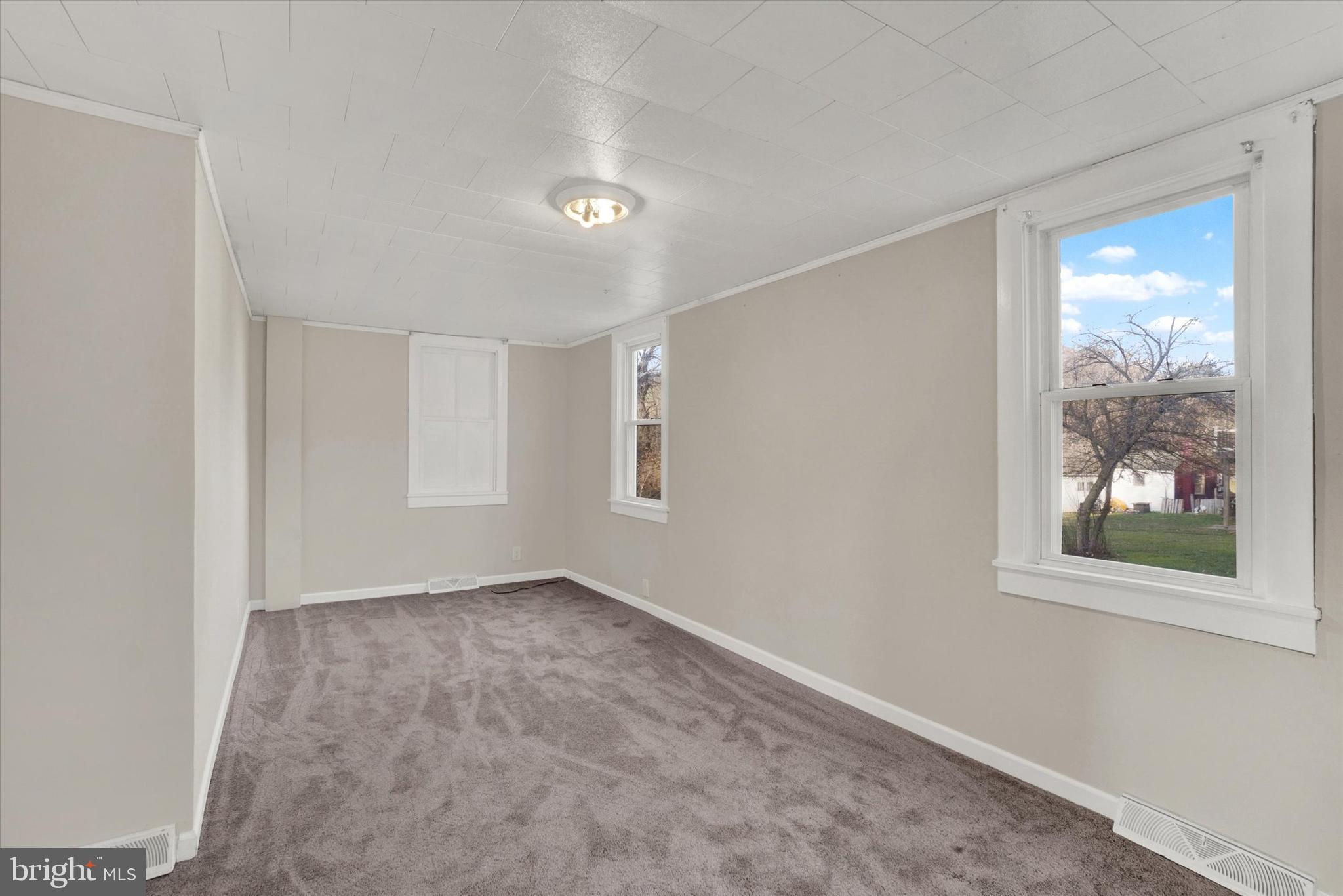 1953 Craley Road Windsor, PA 17366 - Photo 9 of 28 an empty room with windows