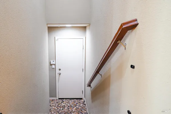 a view of entryway with wooden floor