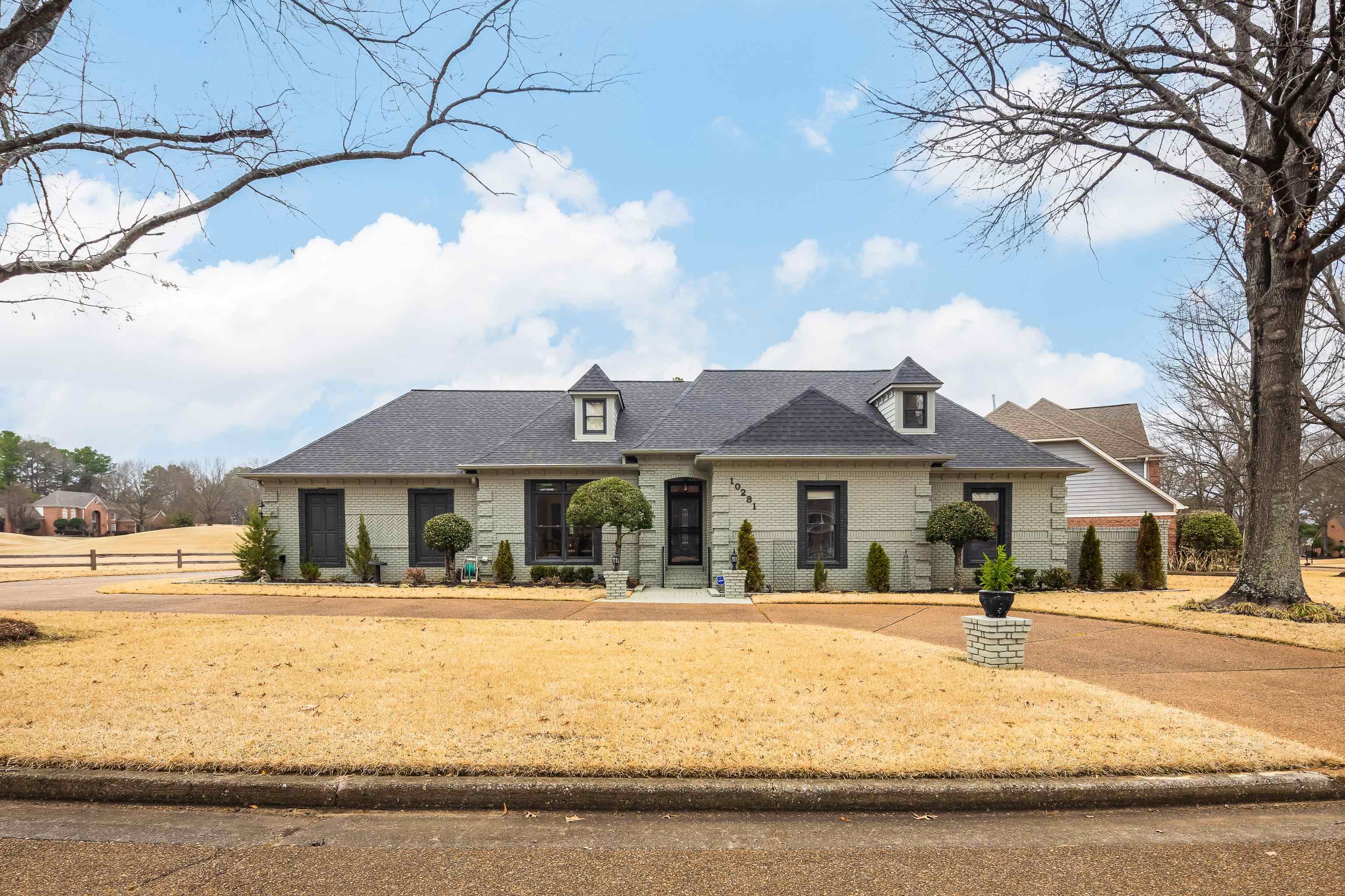 10281 Peyton Path Cove Collierville, TN 38017 - Photo 1 of 40 French country home featuring brick siding and roof with shingles