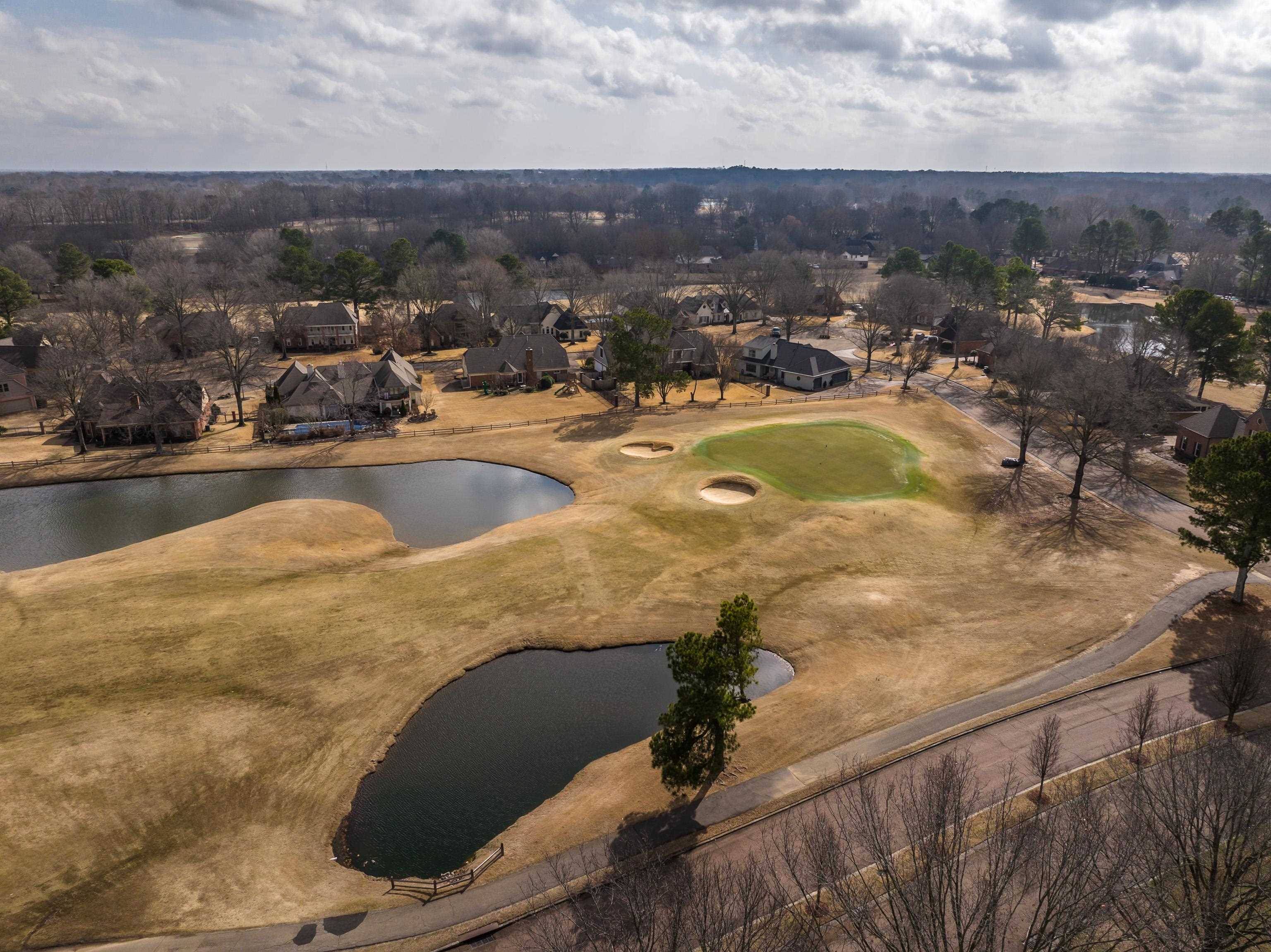 10281 Peyton Path Cove Collierville, TN 38017 - Photo 18 of 40 Aerial view of residential area featuring a local golf course and a nearby body of water