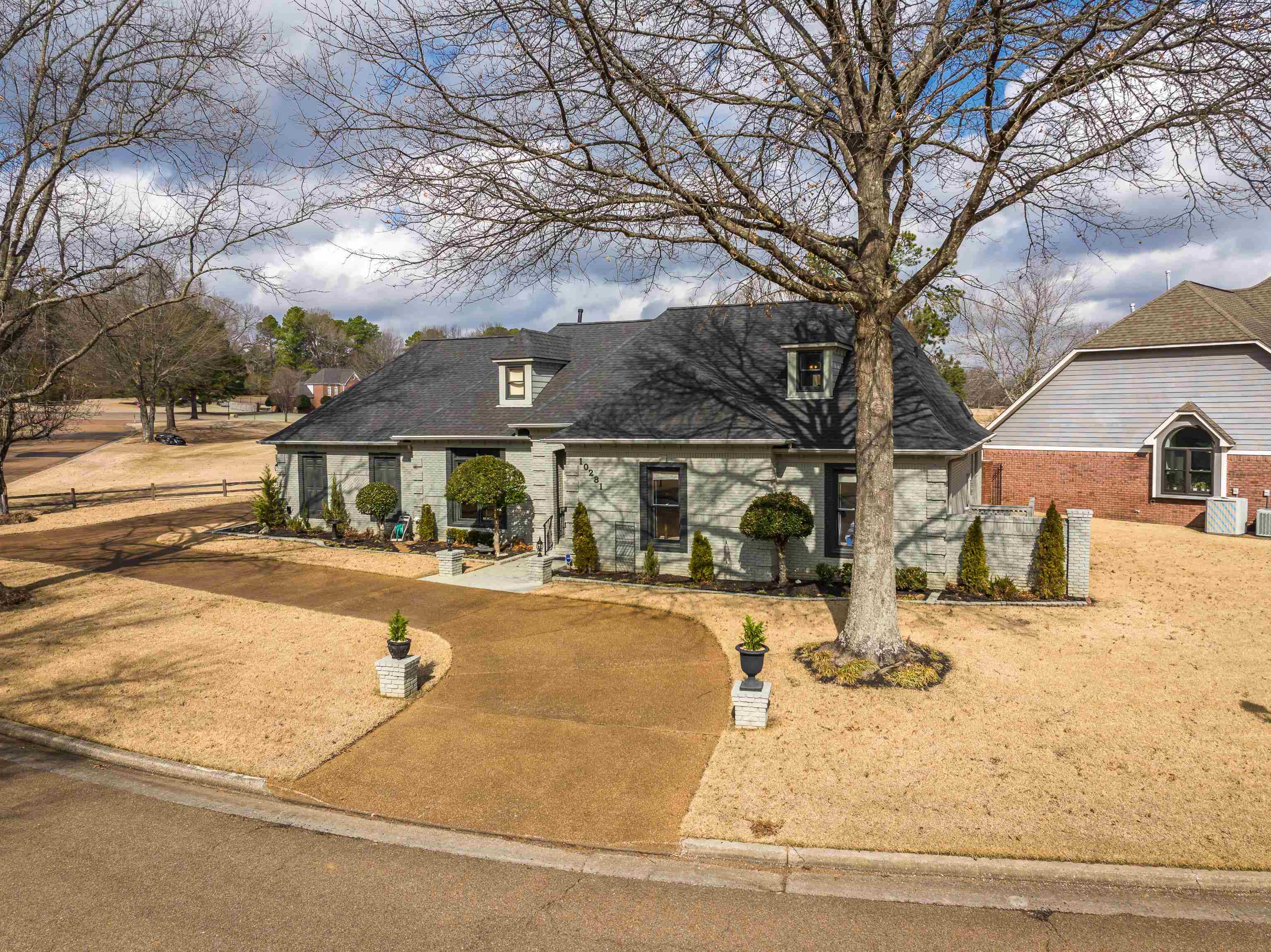 10281 Peyton Path Cove Collierville, TN 38017 - Photo 2 of 40 View of front of house featuring roof with shingles