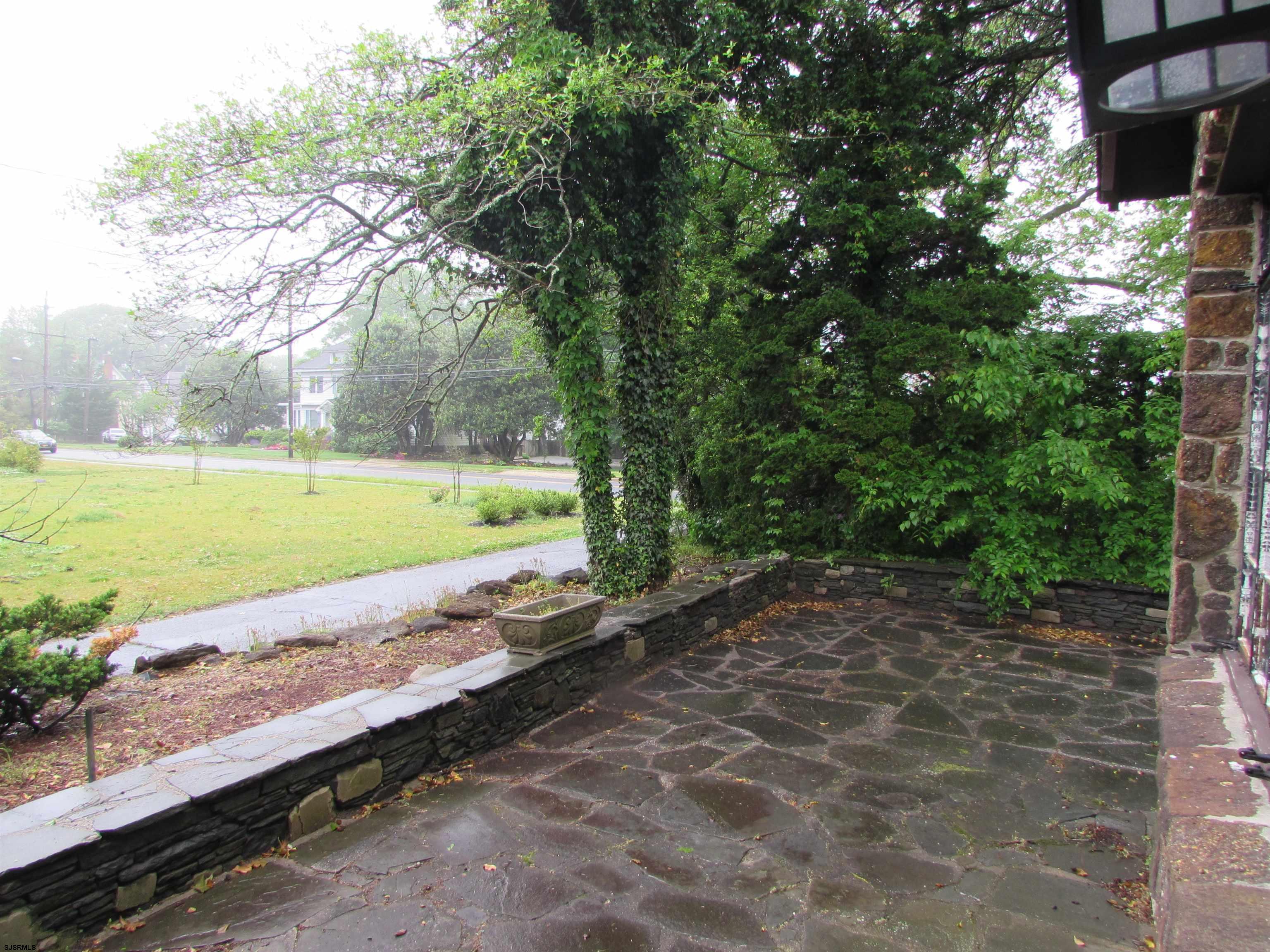 744 Shore Road Linwood, NJ 08221 - Photo 6 of 43 a view of a yard with an outdoor space