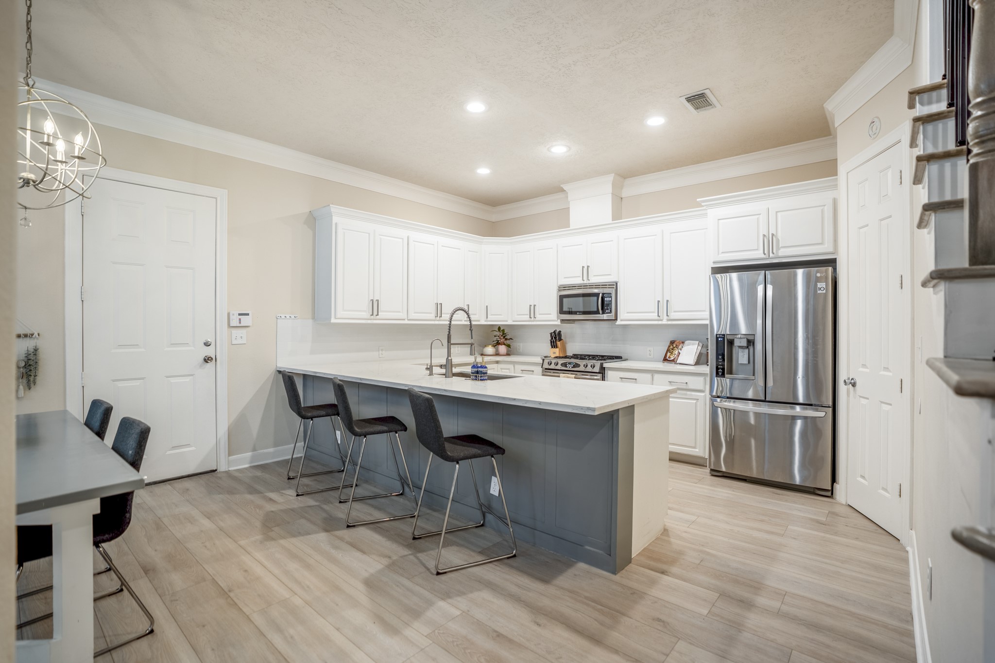 4236 Drake Street Houston, TX 77005 - Photo 4 of 43 This modern chef's kitchen and breakfast area to the left of the entry were fully remodeled in 2024.